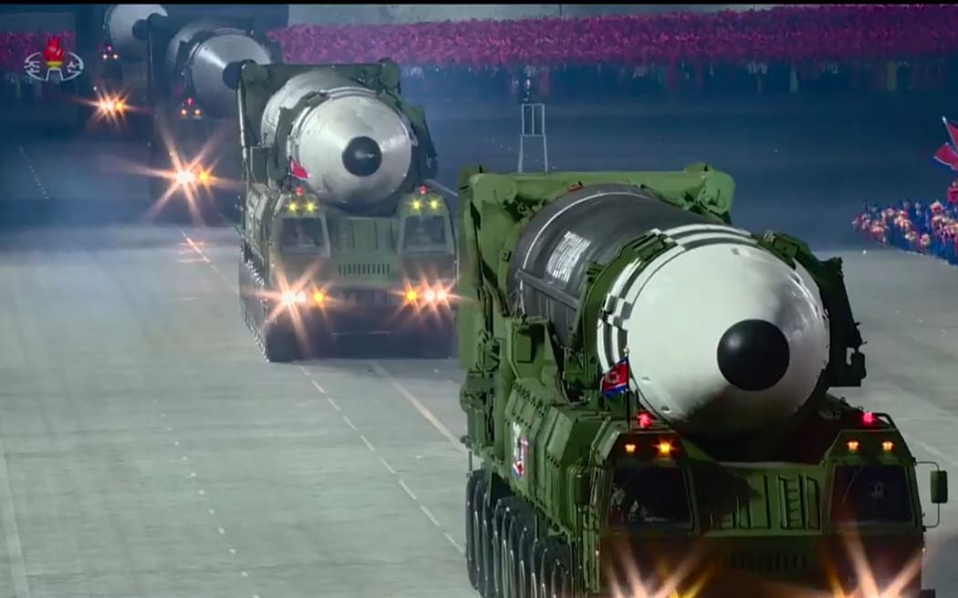 A screen grab taken from a KCNA broadcast on October 10, 2020 shows what appears to be new North Korean intercontinental ballistic missiles during a military parade on Kim Il Sung square in Pyongyang.