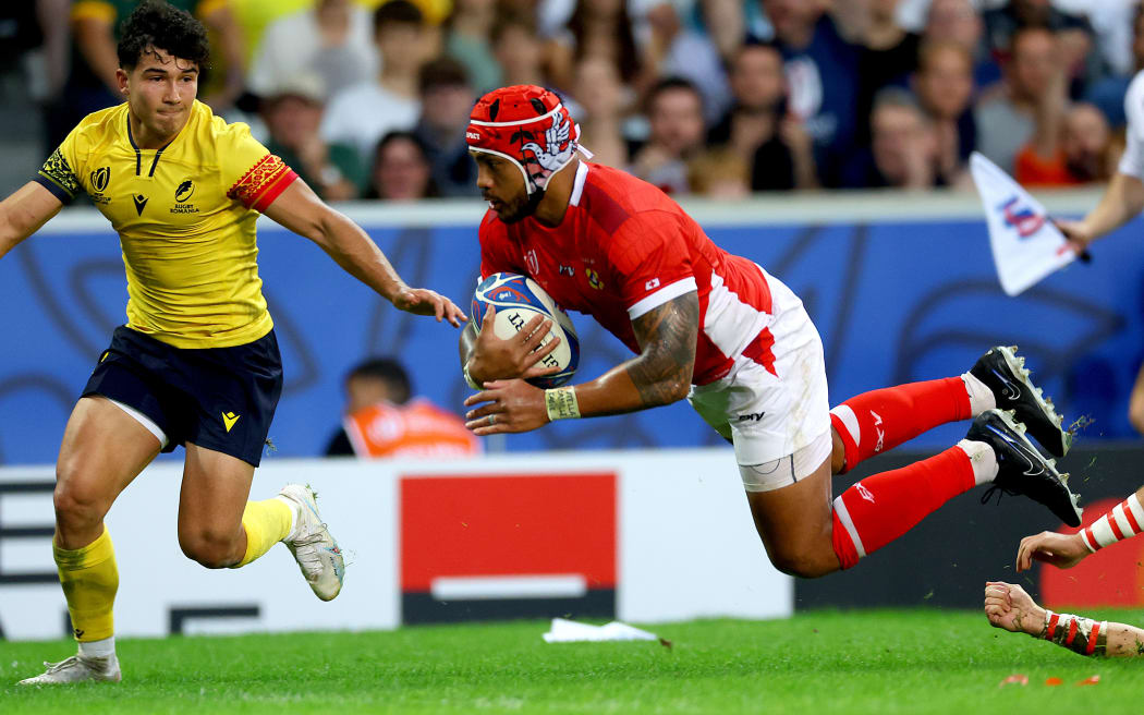 Tonga’s Pita Ahki scores a try against Romania at the 2023 Rugby World Cup in a Pool B match in Lille. 
(Mandatory Credit ©INPHO/James Crombie)