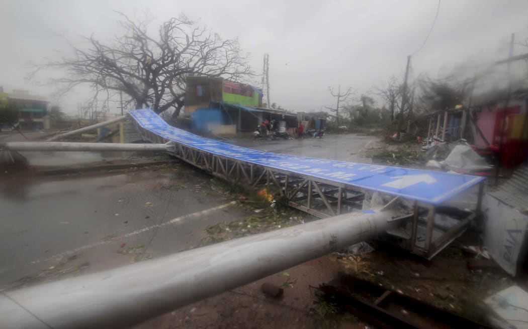 Damaged signage lies on a street in Puri district after Cyclone Fani hit the coastal eastern state of Odisha, India, Friday, May 3, 2019.