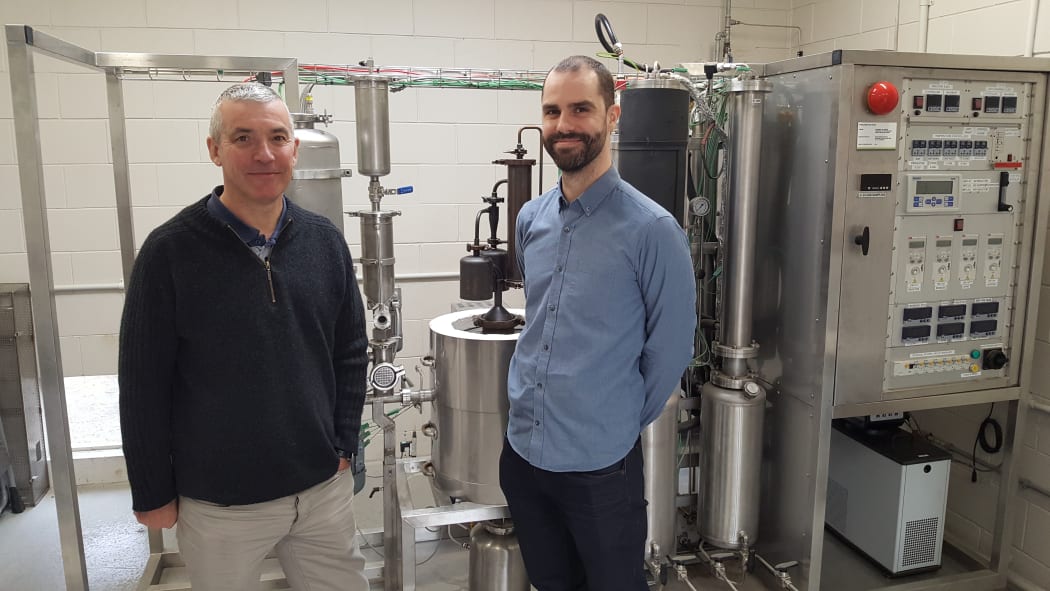 Paul Bennett and Ferran de Miguel Mercader in the pyrolosis lab at Scion, where wood is turned into pyrolosis oil at high temperatures.