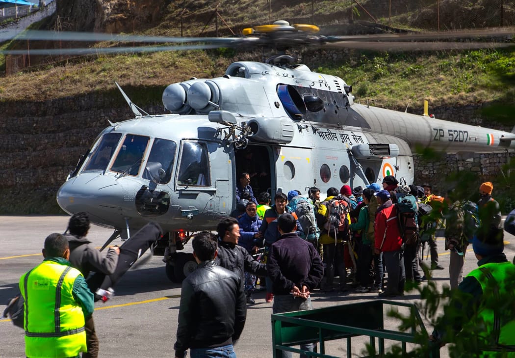Post Earthquake Nepal - Indian nationals frantically attempting to get on the Indian Airforce relief helicopter