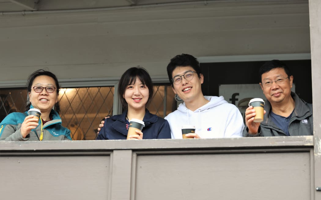 South Australian tourists Ling Yan, Annie Liu, Sai Liu and Xu Liu at Piha today.