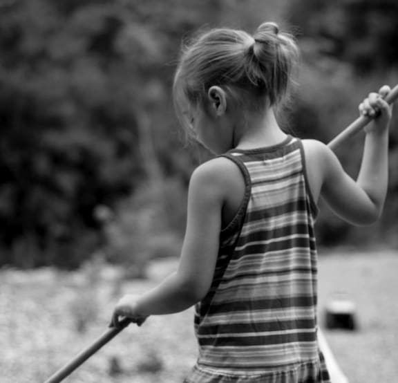 Girl sweeping