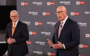 Australia Prime Minister Anthony Albanese, left, and Peter Dutton at the leaders debate 8 April 2025.