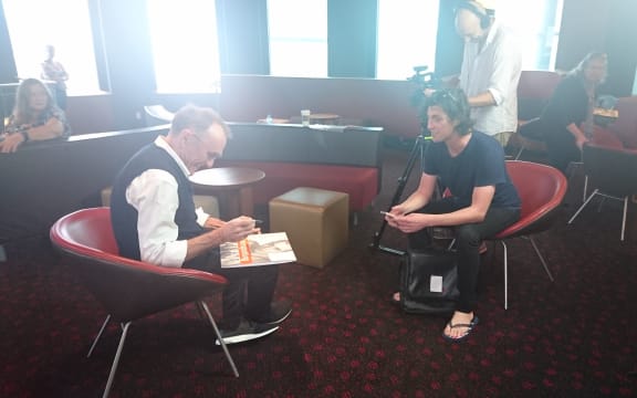 Danny Boyle signs Steve Newall's copy of the Trainspotting soundtrack