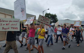 Nearly a hundred people have turned out to protest against plans to build New Zealand's biggest factory chicken farm next to a marae, just south of Dargaville.