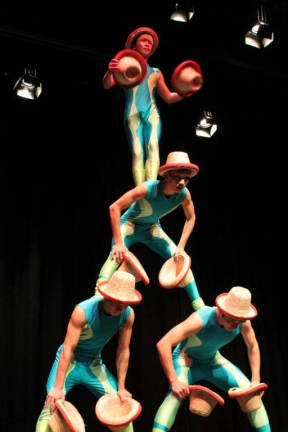Juggling hats.