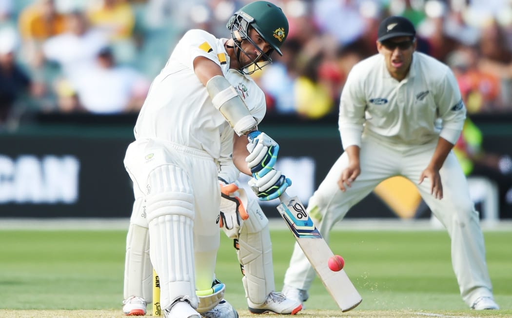 Mitchell Starc hits a boundary during day 2 of the 3rd cricket test match between New Zealand Black Caps and Australia. Saturday 28 November 2015.