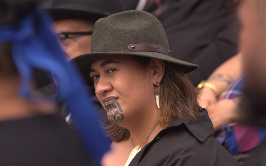 Kuini Nga wai hono i te po at the Hīkoi mō Te Tiriti on Parliament grounds.