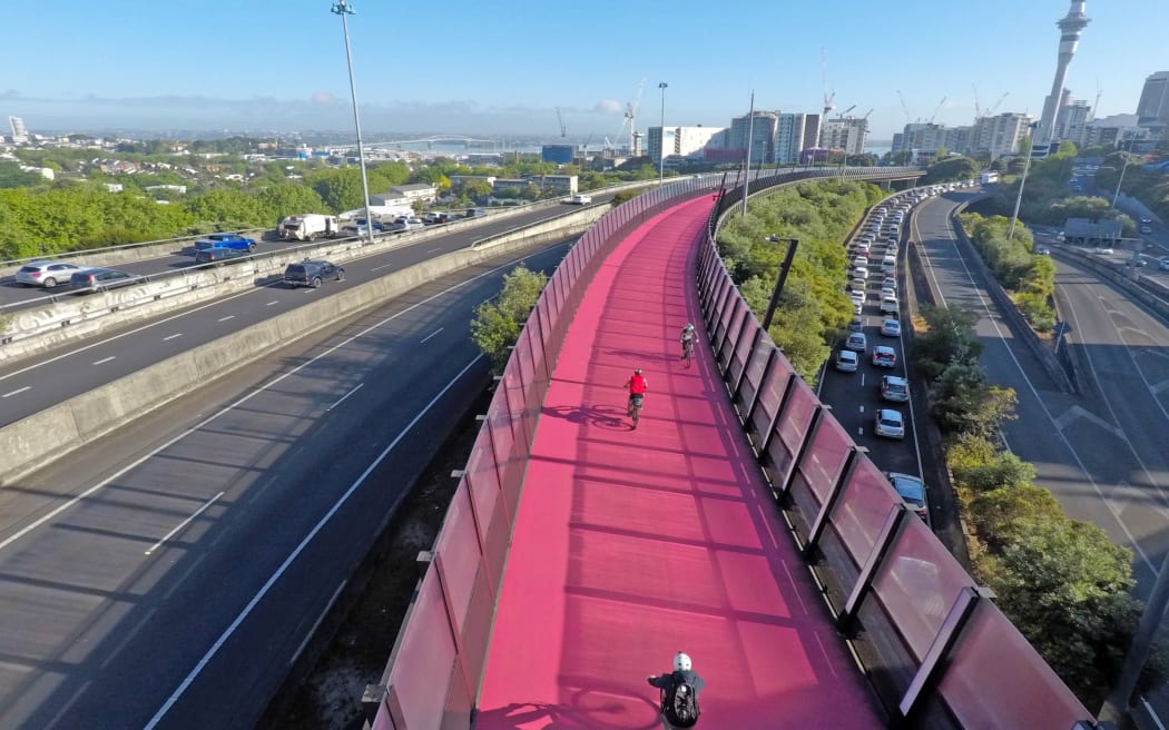 Commuters head into the central city on the Auckland Central Motorway, and cycleway.