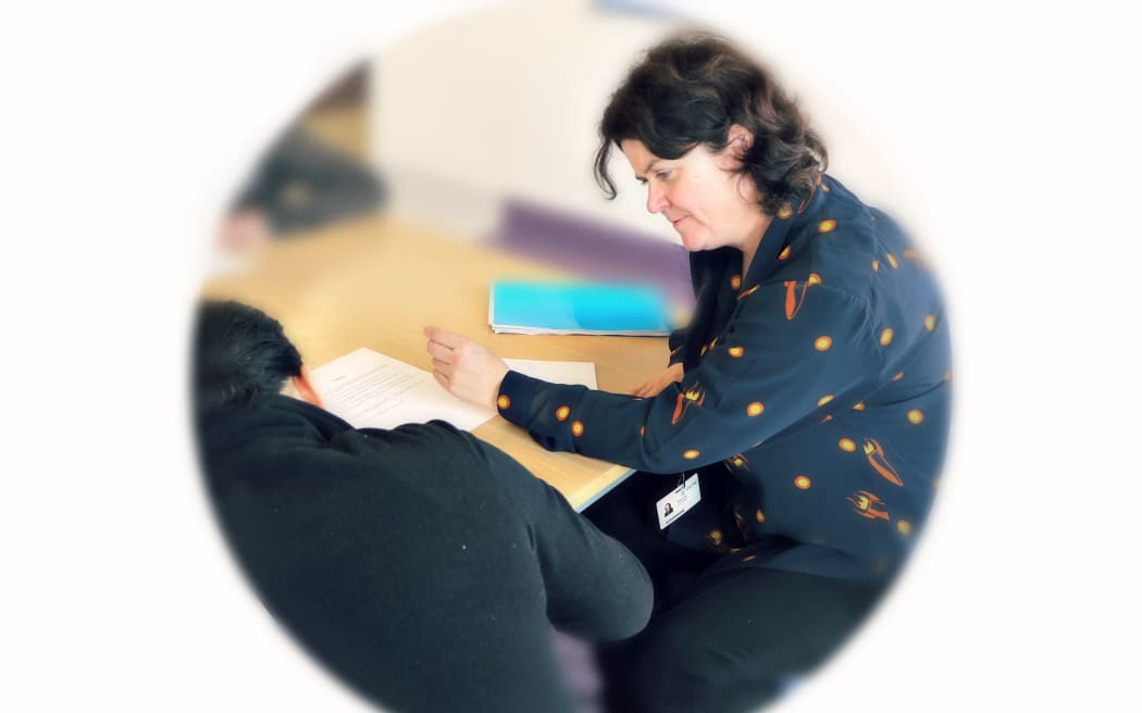 Stacey Shortall and a woman prisoner being supported through the Mother's Project at ARWCF.