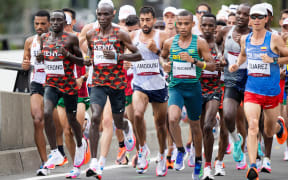 Eliud Kipchoge leading the Tokyo Olympic marathon field.