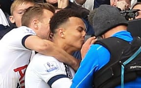 Tottenham's Dele Alli kisses the camera after scoring a goal.