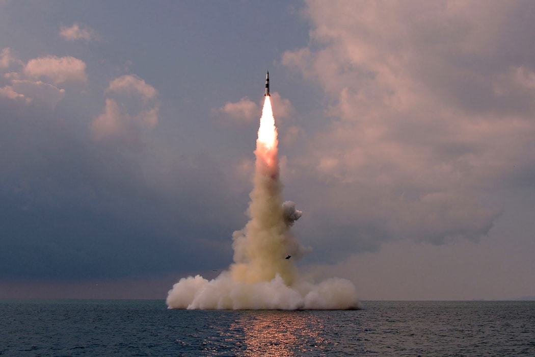 This picture taken on October 19, 2021 and released from North Korea's official Korean Central News Agency (KCNA) on October 20, 2021 shows test fire of a new type submarine-launched ballistic missile in an undisclosed location in North Korea.
