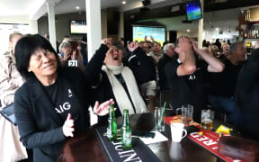 All Blacks fans at the Homestead Sports Bar in Kerikeri react to Jordie Barrett’s missed kick