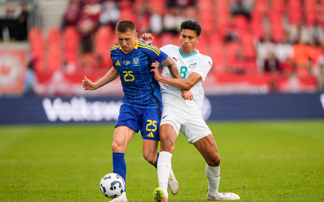Yegor Nazaryna of Ukraine and Marko Stamenic of New Zealand