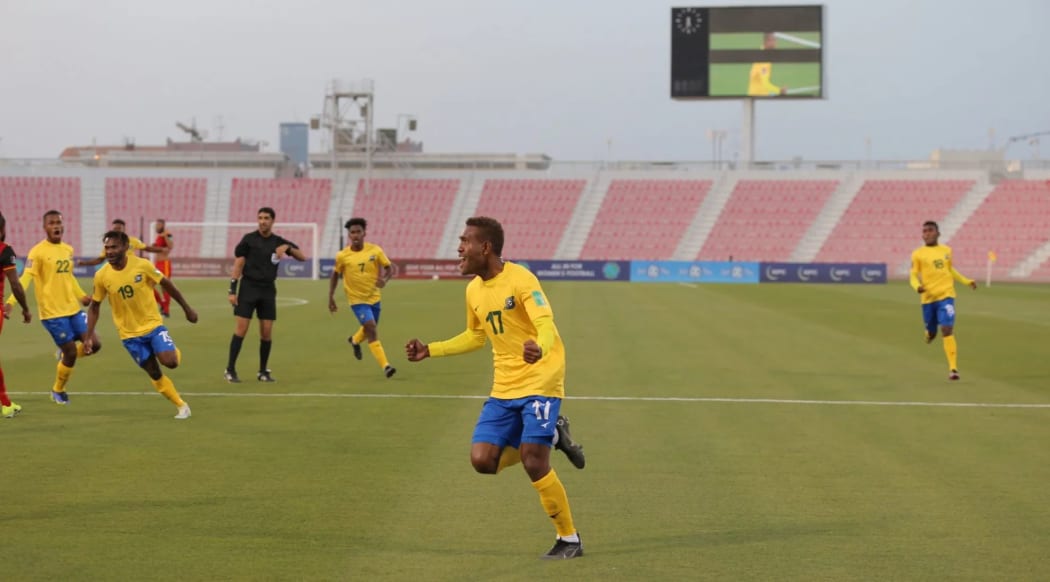 Alwin Hou celebrates a goal against Papua New Guinea.
