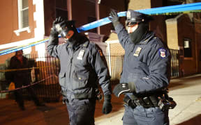 Two New York police officers at the scene of murder