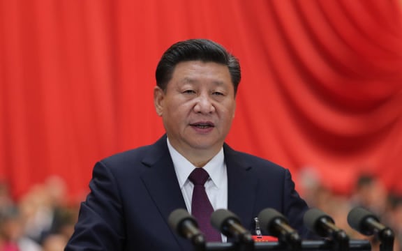 Xi Jinping delivers a report to the 19th National Congress of the Communist Party of China on behalf of the 18th Central Committee at the Great Hall of the People in Beijing.
