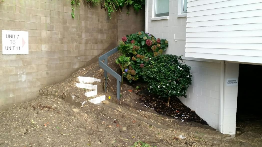 A Kohimarama property where a cliff collapsed in last night's torrential rain.