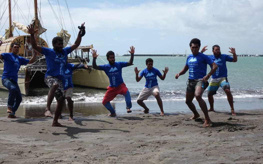 The crew of the Uto ni Yalo respond to Ngati Te Whiti's powhiri with a Fijian challenge.