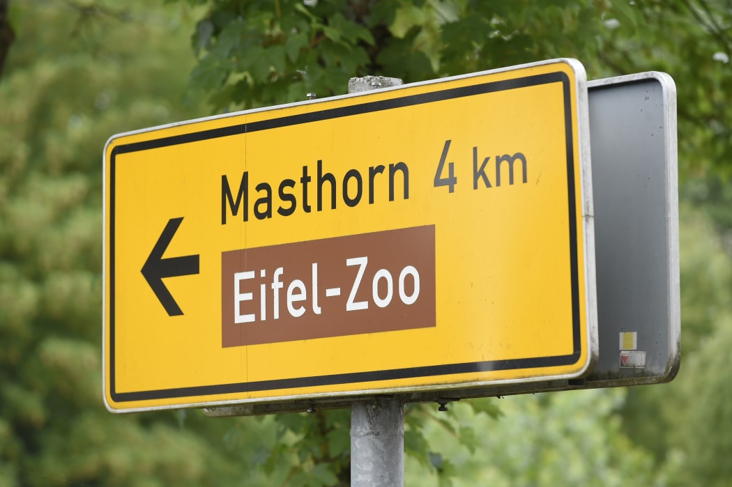 A sign showing the way to the Eifel Zoo in Lunebach, western Germany.