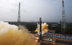 This handout photo taken and released by Indian Space Research Organisation (ISRO) on October 21, 2023, shows the lift-off of the Gaganyaan Test Vehicle (TV) from the Satish Dhawan Space Centre in Sriharikota, an island off the coast of southern Andhra Pradesh state. India on October 21 successfully launched the first unmanned trial run of its upcoming crewed orbital mission, in the latest milestone for its spacefaring ambitions. (Photo by ISRO / AFP) /
