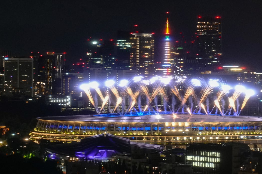 Fireworks explode over the Olympic Stadium during the closing ceremony of the Tokyo 2020 Olympic Games in Tokyo, Japan.