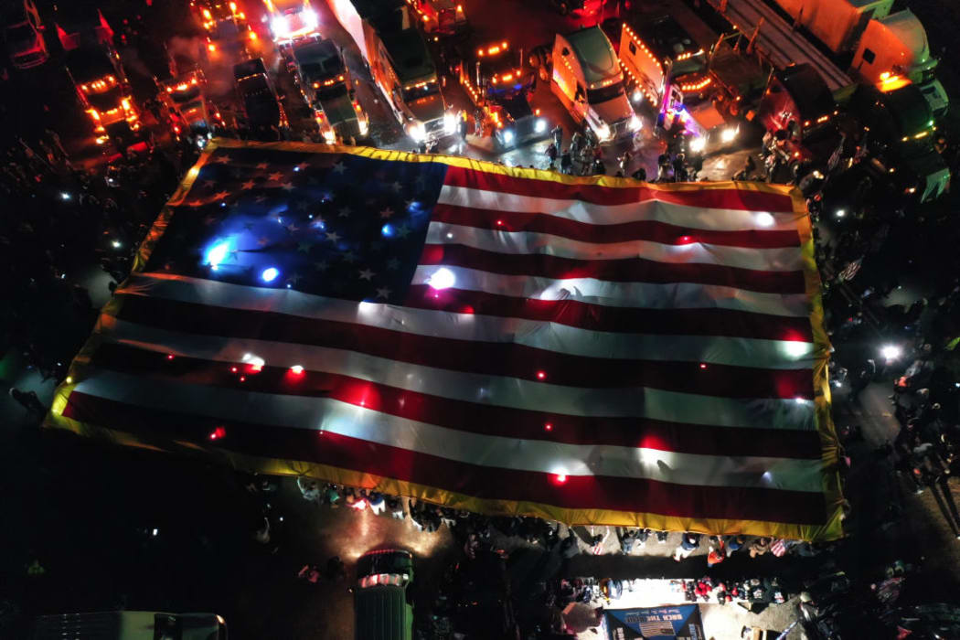 An aerial view of a huge USA flag is seen as 'The People's Convoy' are seen in Hagerstown of Maryland, United States on March 5, 2022 as they are planned head to nation's capital on Sunday.