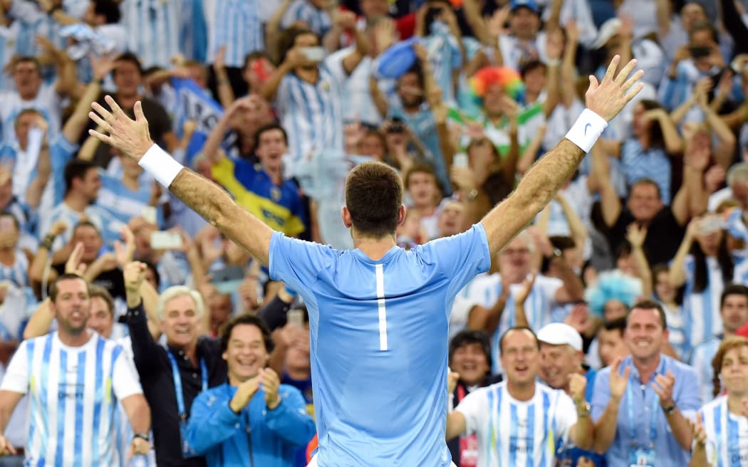 Juan Martin del Potro celebrates his Davis Cup win over Marin Cilic with Argentina fans