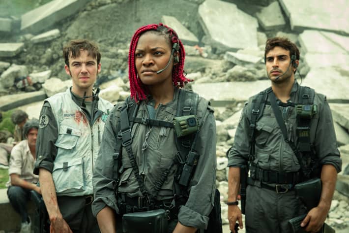 FX's Alien: Earth -- Pictured: (l-r) Alex Lawther as Hermit, Diêm Camille as Siberian, Moe Bar-El as Rashidi. CR: Patrick Brown/FX
