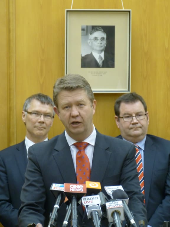 David Parker and Grant Robertson flank David Cunliffe as he announces his lineup.