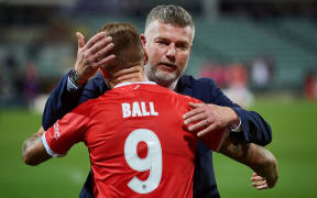 Wellington Phoenix coach Ufuk Talay congratulations striker David Ball following their 3-1 win over the Perth Glory at HBF Park on April 18 2021 in Perth, Australia.