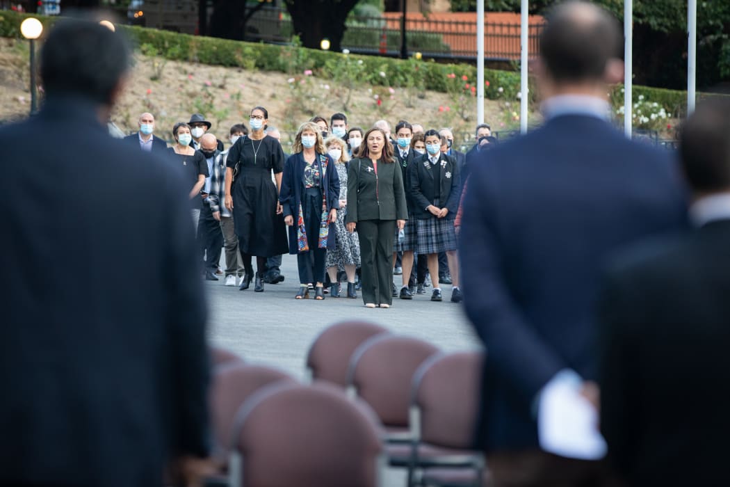 Marama Davidson leads a group of various members of the local community back onto Parliament grounds two weeks after the violent culmination of a 3-week occupation by protesters.