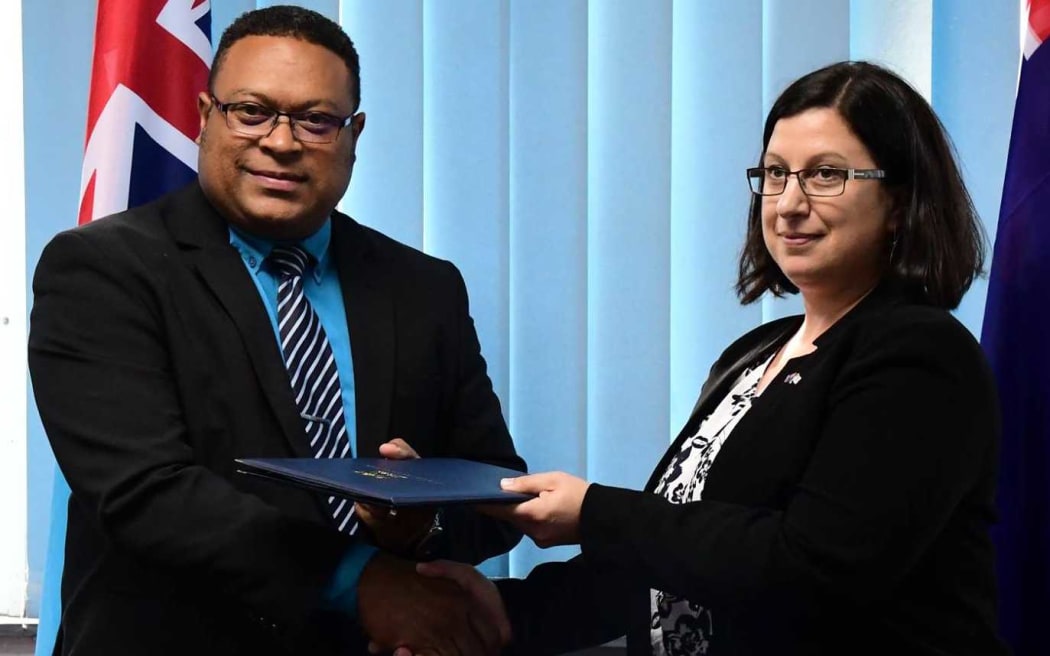 The permanent secretary of Fiji's Ministry of Defence, Manasa Lesuma, with the assistant secretary of Australia's Department of Defence, Sue Bodell.