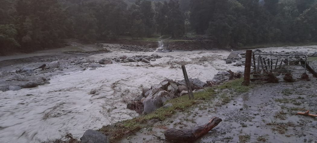 A flooded river in Te Puia Springs Valley, Gisborne region, 23 March 2022