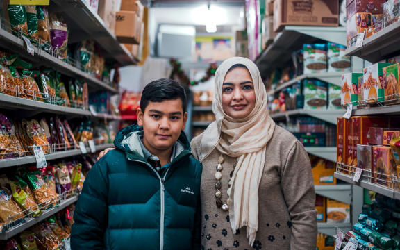 (L-R) Aliyaan Abbas and mother Masooma Mehdi in their local desi food store.