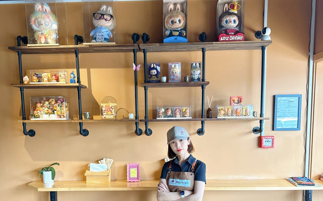 Auckland woman Tiki Jiang and her collections.