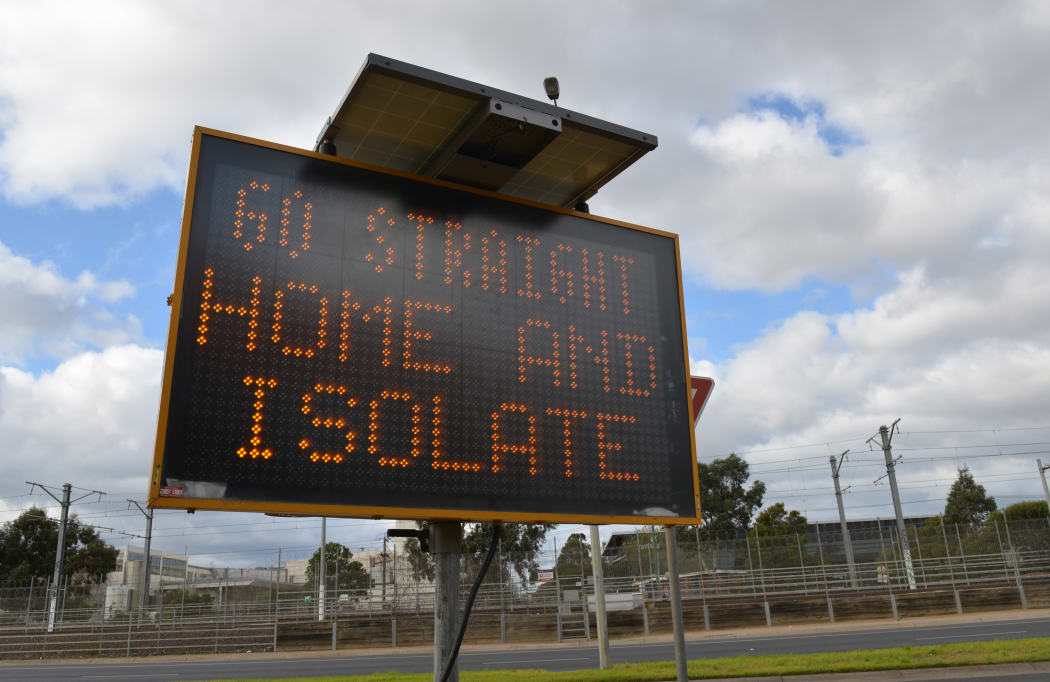 \A warning sign is seen as part of Covid-19 precautions as Australia's Victoria state reimposes lockdown.