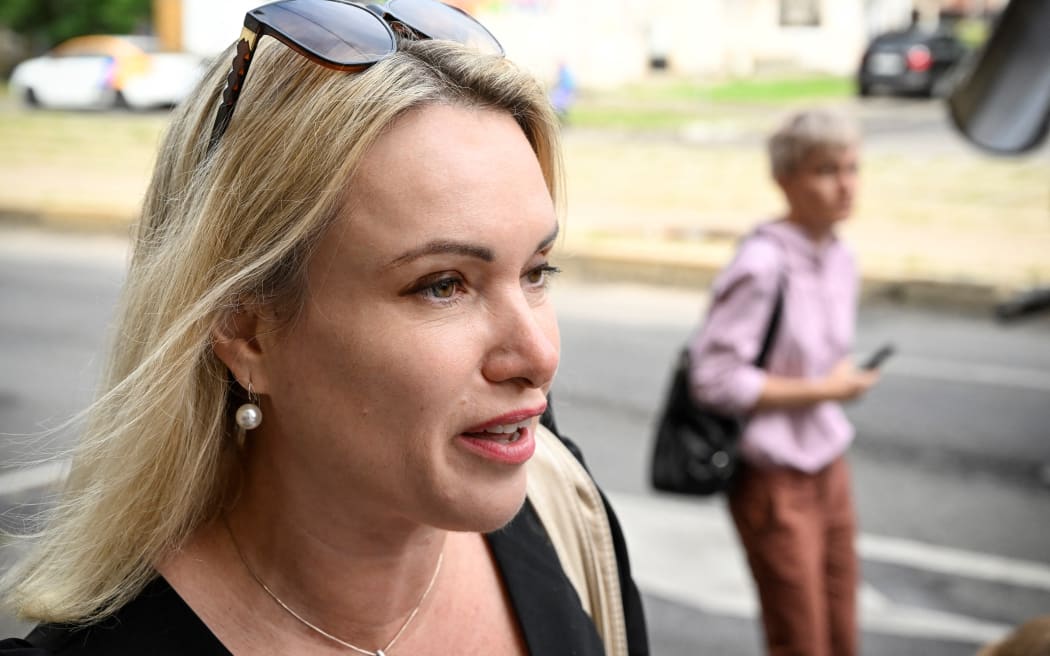 Marina Ovsyannikova, a journalist who became known after protesting against the Russian military action in Ukraine during a prime-time news broadcast on state television, arrives for her court session over charges of "discrediting" the Russian army fighting in Ukraine, in Moscow on August 8, 2022.