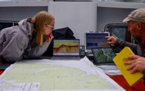 Scientists sampling marine sediments in Fiordland on a recent trip aboard the university research vessel Polaris II.
