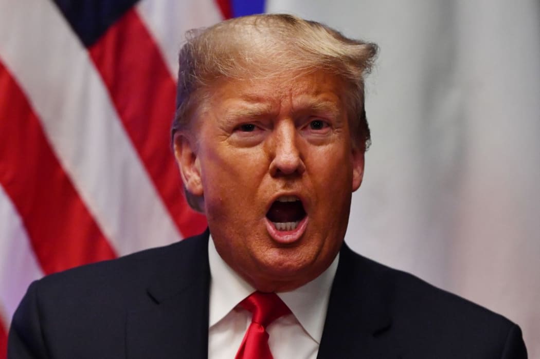 US President Donald Trump speaks during a bilateral meeting with Italy's Prime Minister Giuseppe Conte (unseen) at the NATO summit at the Grove hotel in Watford, northeast of London.