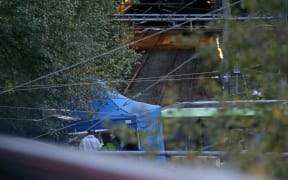 Rail Accident Investigation Branch said the derailment had happened on a sharp curve with a 12 mph speed limit.