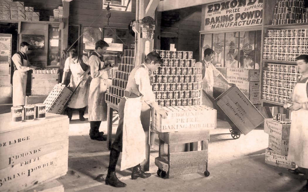 Inside the Edmonds factory, c.1908. Thomas and Will are in the office, with tins of baking, custard and egg powder ready for dispatch.
