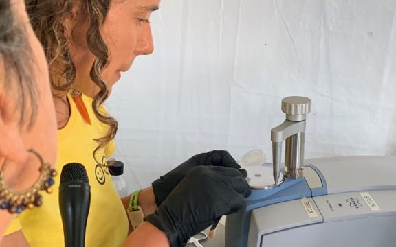 Inside the drug checking tent with Jax Brown