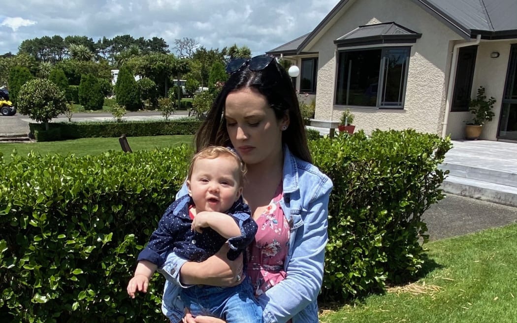 Hugo (at 12 months) and Chelsey.