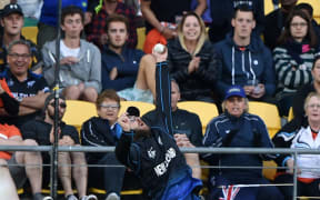 Daniel Vettori leaps high to catch Marlon Samuels out.