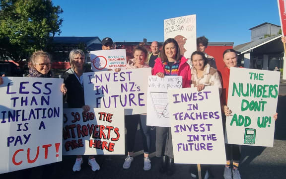 Striking secondary school teachers picketing outside Selwyn College in Auckland on Wednesday, 29 March.