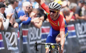 Jason Christie celebrates his second national men's road race title.