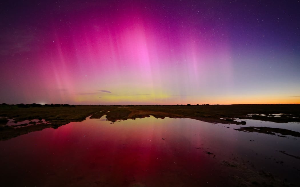 An image of the aurora australis at the peak of its display, taken by Natalie Crowther at Lake Ellesmere in Canterbury on 11 October 2024.